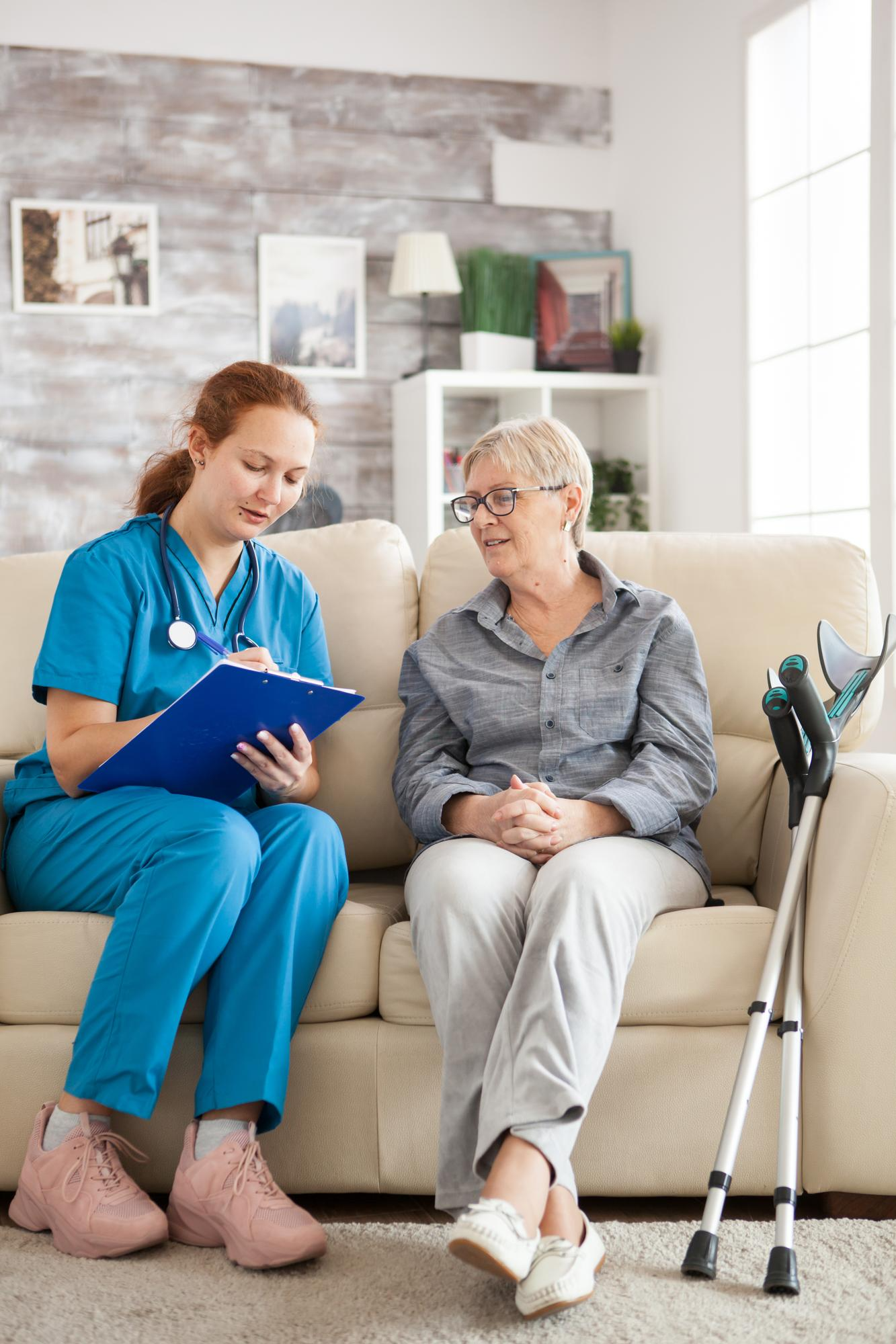 Caring nurse with patient